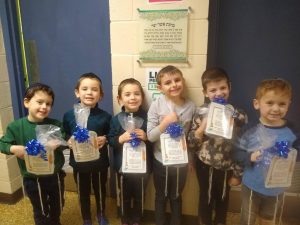 The Pre 1A boys that have completed their Asher Yatzar chart. Morah Rubin got special washing cups with their names for the boys!